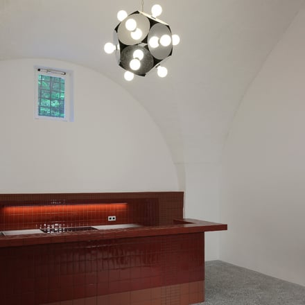 Spaces along the outer ring wall.