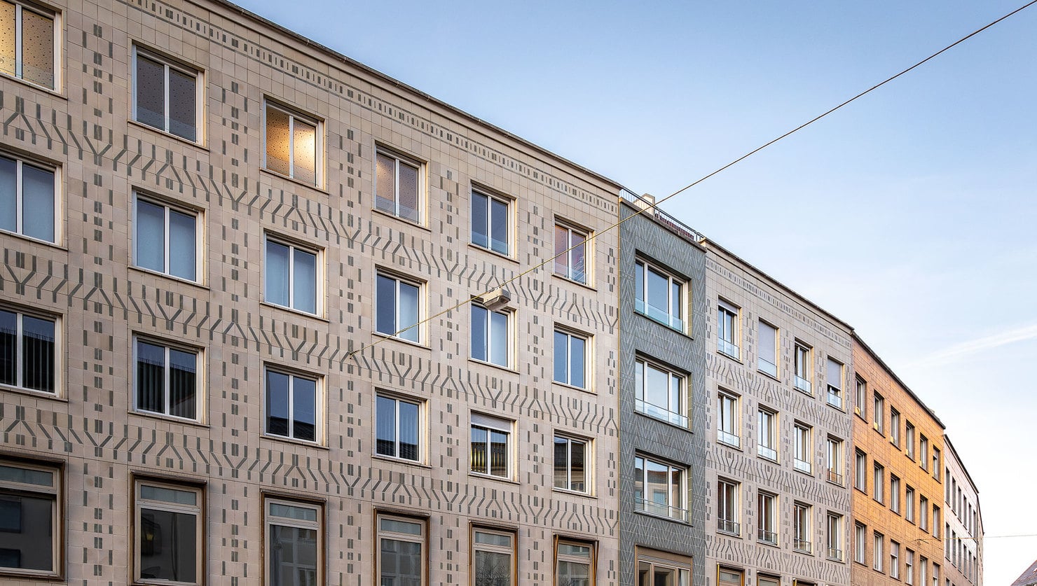 Existing ceramic façade – new windows.