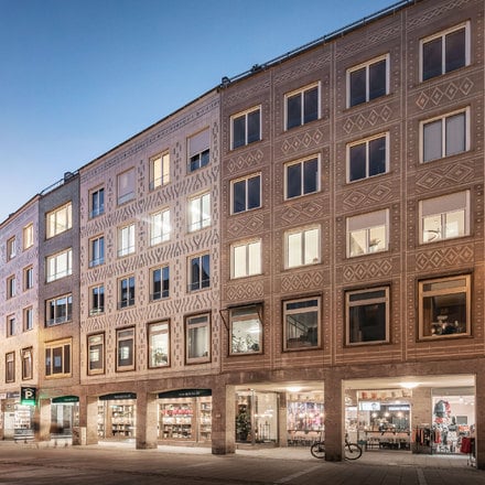 Existing ceramic façade – new windows.